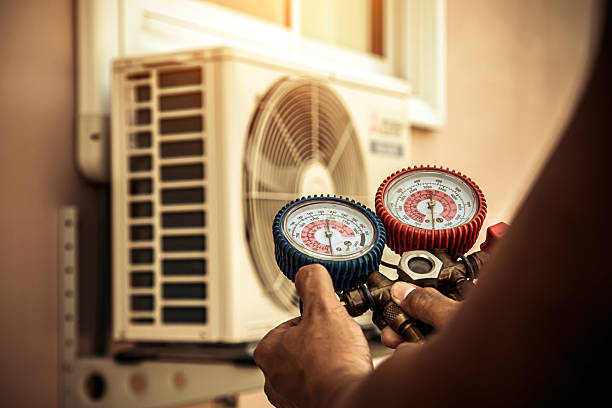Professional Air Conditioning Service technician working in Springfield, LA